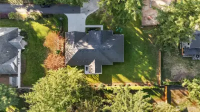 Aerial views showcase the expansive, level lot.