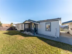 Welcoming curb appeal with mountain views in desirable Meadow Ridge neighborhood