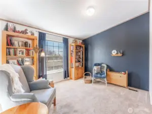 Dedicated den or office just off the main living area