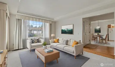 Formal living space with 2 large windows and ample natural light