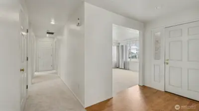 Light and bright throughout the home featuring brand new carpet and original hardwoods