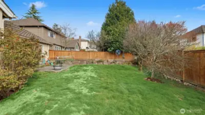 Large lot surrounded by mature trees and landscaping. **Image is Digitally Enhanced**