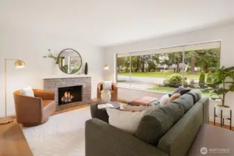 West home - 22511: Here you will enjoy West facing picture windows and wood burning fireplace for the colder days.