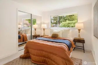 West home - 22511: Generous primary bedroom with sliders to the large deck.