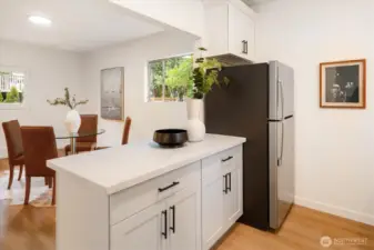 East Cottage - 22511 1/2: In this open kitchen you can prep while you entertain.