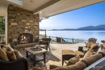 Covered outdoor living space with gas fireplace
