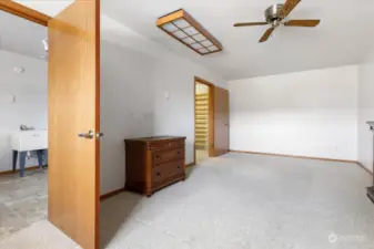 Den looking into laundry room