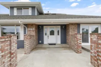 Entry way to front door - patios on either side.