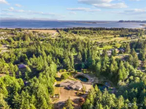 Aerial view of property with Port and Ocean in the background.