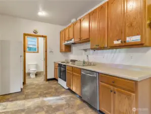 Kitchenette and bathroom of ground floor apartment.