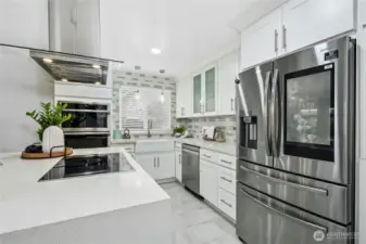 All new high-end appliances- Induction Stove and refrigerator that you can watch Netflix on!