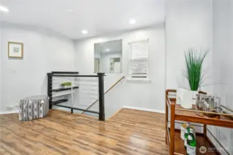 New custom modern railing was put in along with all new floors!