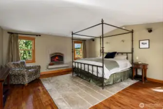 Primary bedroom with propane fireplace