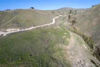 Cowboy road along the 21 Acre Lot 6 has easy access. Wander along the original homestead trail that parallels the Aspen and creek area.