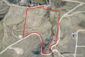 21.5 Acres enjoys easy access off of Cowboy Road and 2 distinct homesites on this elevated acreage.  One homesite is tucked into remarkable green Spring-fed creek with Aspens and other trees, shrubs and flowering trees. Original Homestead location found here. Recreate a new home or Cabin where the homesteaders established a highly desirable location. Or go to the top of this property for stellar view building site.