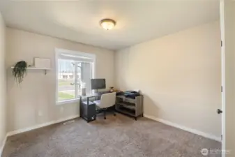 Large bedroom facing front of home.