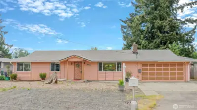 NEW ROOF, NEW PAINT, NEW FLOORING [ SINGLE LEVEL LIVING ] Great bones, great house and LARGE LOT (.25) 3 bedrooms, (2) 3/4 bathrooms, open living floor plan, large kitchen with eating area and open to the large main living room, pellet stove and great covered back deck. New Roof, wood laminate flooring and interior paint. Garage converted by last tenant into living space. This is a perfect opportunity to make this home everything that you would love. Garage has been converted (add 520 sq.ft. to SCR square footage 1248 + 520=1768 ), large storage sheds in the backyard for tons or storage. Plenty of off street parking and room for an RV. You will love the covered back deck that gives you year around options to entertain.