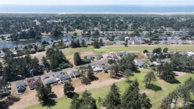 AERIAL VIEW OF THE HOME WEST TO THE GRAND CANAL AND PACIFIC OCEAN IN THE BACK GROUND!