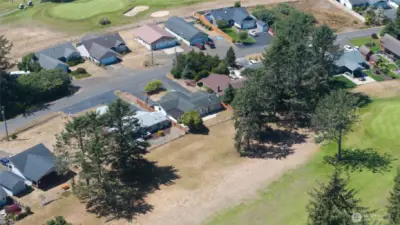 AERIAL VIEW OF THE FIFTH FAIRWAY AND BACK YARD OF THE HOME!