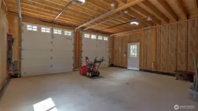 Plenty of room in this garage that features upgraded electrical and has been wired for generator.