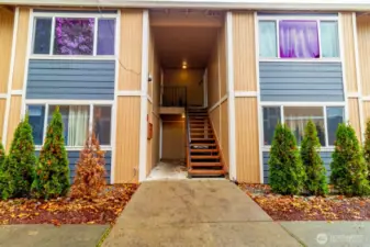 Stairs Recently rebuilt, covered entry ensures tenants stay dry.