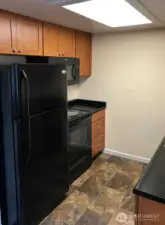 Unit 3 kitchen, plenty of storage and ease to clean countertops.