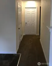 Entry to the left, down the hall are bedrooms, bathroom, laundry and storage. Each unit has extra storage within them!