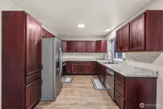 Remodeled kitchen with new appliances, counters, sink and updated electrical