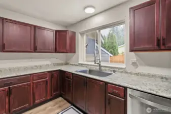 Large window for extra natural light and backyard view