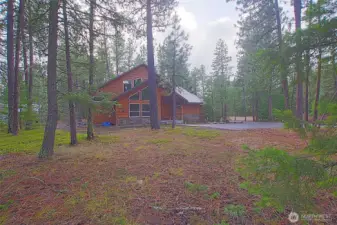 Beautiful treed lot w paved circular drive