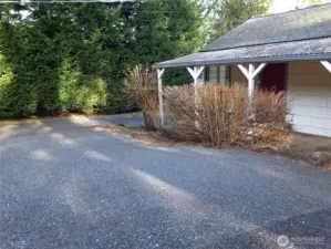 Not only are there 4 covered parking places, there's also lot of driveway parking