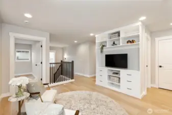 Light-filled loft with custom built-ins—perfect for work or relaxation.