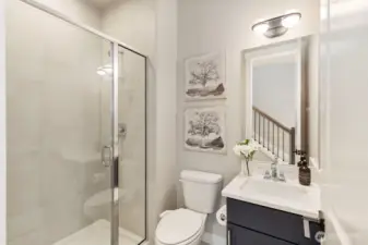 Main floor bathroom with shower.