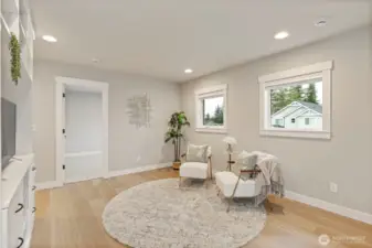 Light-filled loft with custom built-ins—perfect for work or relaxation.