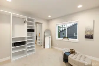 Adjoining bonus room currently styled as an expanded dressing room.  Easily converted back to the fifth bedroom if desired.