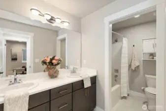 Bathrooms finished with upgraded materials and timeless appeal.