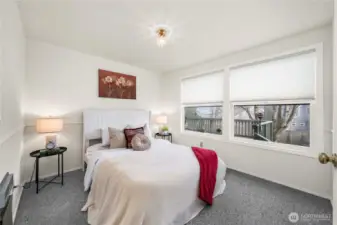 The Guest Suite Bedroom also overlooks the backyard.