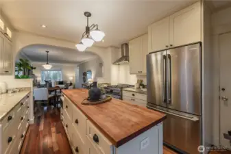 Microwave integrated into the island cabinets.