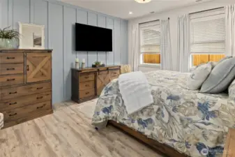 A designer board and batten accent wall in the primary suite adds a stylish, custom touch.