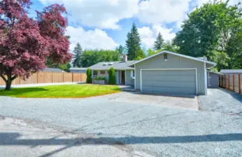 This home has a great floor plan! 4 bedrooms, 1.75 bath and a 2 car garage. This is a quiet spot & yet is just 3 minutes to I-5.  Vertical cedar siding.