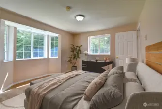 4th bedroom with beautiful views of the yard!  Wake up to nature and the sunshine.