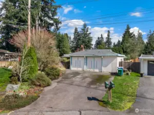 Front yard/garage - access to front courtyard is left of the garage