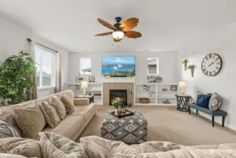 Family room with beautiful built-ins and gas fireplace.