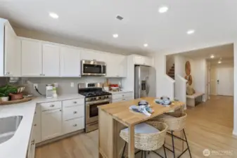 See supplements for colors in home. Home has gray cabinets.