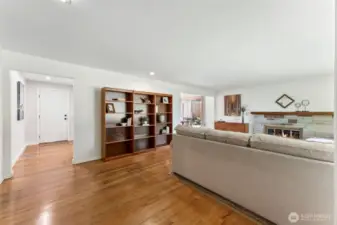 From the entry door you see the living space leading into the kitchen and dining areas.  All flooded with great natural light!
