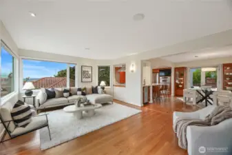 The living room flows effortlessly into the dining room and kitchen.