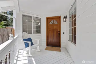Covered front porch is so welcoming. Feels like you're in the country but just minutes from downtown Gig Harbor!