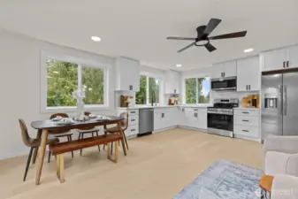 Kitchen with dining area.  All new vinyl windows, recessed lighting and remote-controlled fan.