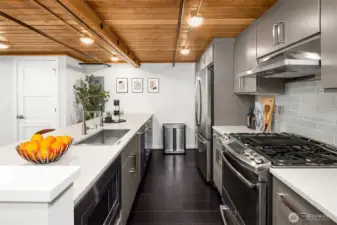 Stainless appliance package, including a gas range.