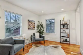 archway in back of den enters into the dining room off the back of the kitchen.